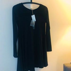 Black king sleeve dress. Brand new with tags.